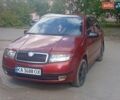 Красный Шкода Фабия, объемом двигателя 1.2 л и пробегом 170 тыс. км за 3400 $, фото 1 на Automoto.ua