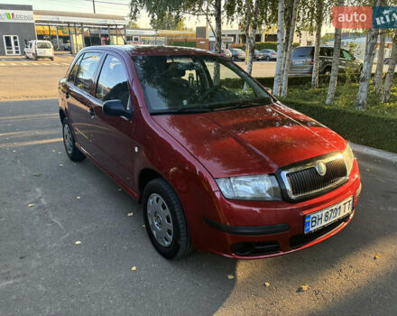 Красный Шкода Фабия, объемом двигателя 1.2 л и пробегом 150 тыс. км за 3950 $, фото 2 на Automoto.ua