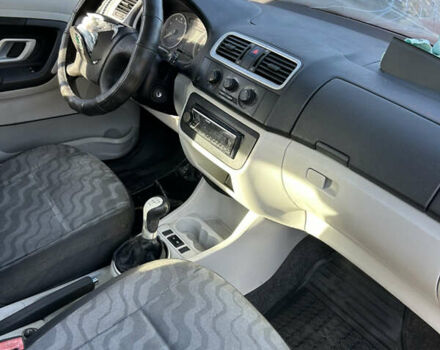 Червоний Шкода Фабія, об'ємом двигуна 1.39 л та пробігом 199 тис. км за 1650 $, фото 3 на Automoto.ua