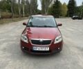 Красный Шкода Фабия, объемом двигателя 1.2 л и пробегом 310 тыс. км за 3800 $, фото 1 на Automoto.ua