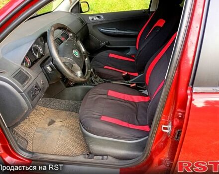 Красный Шкода Фабия, объемом двигателя 1.2 л и пробегом 265 тыс. км за 3200 $, фото 4 на Automoto.ua