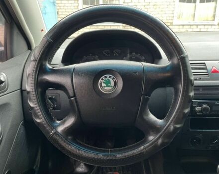 Красный Шкода Фабия, объемом двигателя 1.2 л и пробегом 250 тыс. км за 1650 $, фото 16 на Automoto.ua