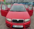 Красный Шкода Фабия, объемом двигателя 1.2 л и пробегом 240 тыс. км за 4200 $, фото 1 на Automoto.ua
