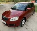 Красный Шкода Фабия, объемом двигателя 1.39 л и пробегом 162 тыс. км за 5500 $, фото 1 на Automoto.ua