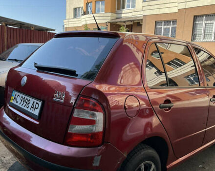 Красный Шкода Фабия, объемом двигателя 1.2 л и пробегом 235 тыс. км за 3922 $, фото 5 на Automoto.ua
