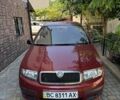 Красный Шкода Фабия, объемом двигателя 1.2 л и пробегом 107 тыс. км за 5500 $, фото 1 на Automoto.ua