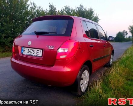 Красный Шкода Фабия, объемом двигателя 1.2 л и пробегом 199 тыс. км за 3999 $, фото 4 на Automoto.ua