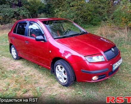 Красный Шкода Фабия, объемом двигателя 1.2 л и пробегом 265 тыс. км за 3200 $, фото 1 на Automoto.ua