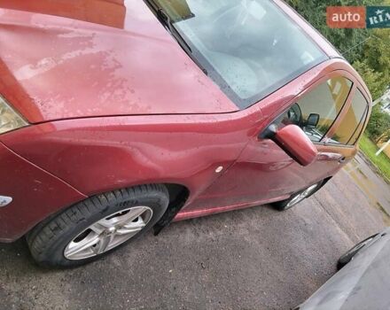 Красный Шкода Фабия, объемом двигателя 1.2 л и пробегом 210 тыс. км за 2500 $, фото 2 на Automoto.ua