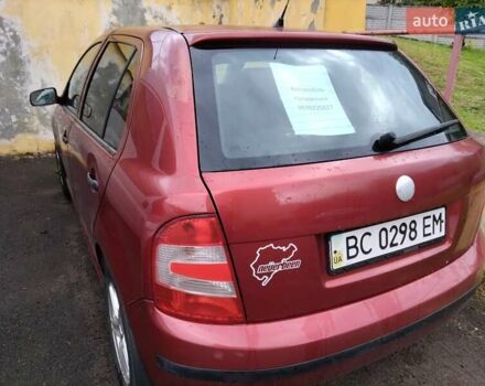 Красный Шкода Фабия, объемом двигателя 1.2 л и пробегом 210 тыс. км за 2500 $, фото 5 на Automoto.ua