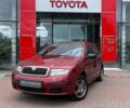 Красный Шкода Фабия, объемом двигателя 1.2 л и пробегом 224 тыс. км за 3400 $, фото 1 на Automoto.ua