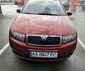 Красный Шкода Фабия, объемом двигателя 1.2 л и пробегом 132 тыс. км за 3900 $, фото 1 на Automoto.ua