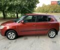 Красный Шкода Фабия, объемом двигателя 1.39 л и пробегом 162 тыс. км за 5500 $, фото 3 на Automoto.ua