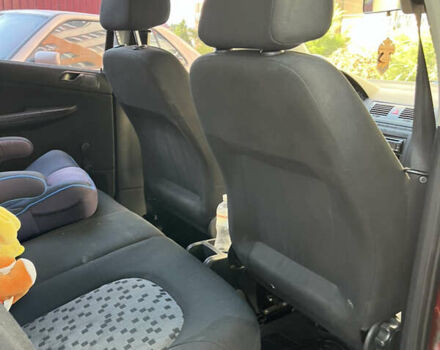 Красный Шкода Фабия, объемом двигателя 1.2 л и пробегом 235 тыс. км за 3922 $, фото 8 на Automoto.ua