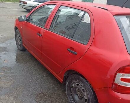 Красный Шкода Фабия, объемом двигателя 1.2 л и пробегом 409 тыс. км за 1800 $, фото 2 на Automoto.ua