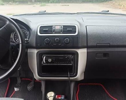 Червоний Шкода Фабія, об'ємом двигуна 1.39 л та пробігом 229 тис. км за 5000 $, фото 17 на Automoto.ua