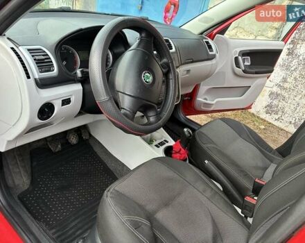 Красный Шкода Фабия, объемом двигателя 1.4 л и пробегом 256 тыс. км за 4500 $, фото 10 на Automoto.ua