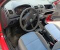 Красный Шкода Фабия, объемом двигателя 1.2 л и пробегом 260 тыс. км за 4430 $, фото 2 на Automoto.ua