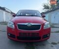 Красный Шкода Фабия, объемом двигателя 1.4 л и пробегом 145 тыс. км за 5788 $, фото 1 на Automoto.ua