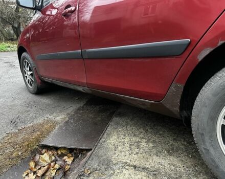 Красный Шкода Фабия, объемом двигателя 1.4 л и пробегом 198 тыс. км за 4500 $, фото 13 на Automoto.ua