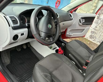 Красный Шкода Фабия, объемом двигателя 1.4 л и пробегом 256 тыс. км за 4500 $, фото 11 на Automoto.ua