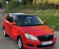 Красный Шкода Фабия, объемом двигателя 1.2 л и пробегом 304 тыс. км за 4000 $, фото 1 на Automoto.ua