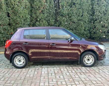 Красный Шкода Фабия, объемом двигателя 1.2 л и пробегом 143 тыс. км за 5500 $, фото 2 на Automoto.ua