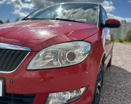 Красный Шкода Фабия, объемом двигателя 1.6 л и пробегом 163 тыс. км за 5999 $, фото 1 на Automoto.ua