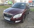 Красный Шкода Фабия, объемом двигателя 1.39 л и пробегом 56 тыс. км за 6700 $, фото 1 на Automoto.ua