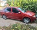 Красный Шкода Фабия, объемом двигателя 1.4 л и пробегом 298 тыс. км за 2300 $, фото 1 на Automoto.ua