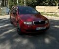 Красный Шкода Фабия, объемом двигателя 1.2 л и пробегом 219 тыс. км за 2600 $, фото 3 на Automoto.ua