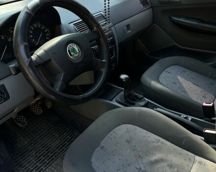 Красный Шкода Фабия, объемом двигателя 1.2 л и пробегом 219 тыс. км за 2600 $, фото 19 на Automoto.ua