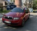 Красный Шкода Фабия, объемом двигателя 1.2 л и пробегом 219 тыс. км за 2600 $, фото 6 на Automoto.ua