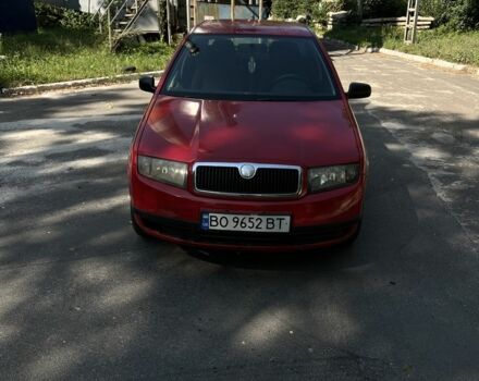 Красный Шкода Фабия, объемом двигателя 1.2 л и пробегом 219 тыс. км за 2600 $, фото 1 на Automoto.ua