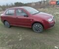 Красный Шкода Фабия, объемом двигателя 1.39 л и пробегом 245 тыс. км за 3300 $, фото 1 на Automoto.ua