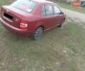 Красный Шкода Фабия, объемом двигателя 1.39 л и пробегом 245 тыс. км за 3300 $, фото 2 на Automoto.ua