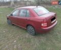 Красный Шкода Фабия, объемом двигателя 1.39 л и пробегом 245 тыс. км за 3300 $, фото 1 на Automoto.ua