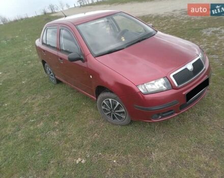 Красный Шкода Фабия, объемом двигателя 1.39 л и пробегом 245 тыс. км за 3300 $, фото 3 на Automoto.ua
