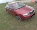Красный Шкода Фабия, объемом двигателя 1.39 л и пробегом 245 тыс. км за 3300 $, фото 3 на Automoto.ua