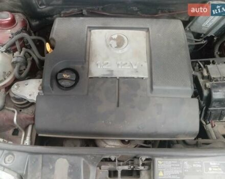 Шкода Фабия 2006 в Изюме на Automoto.ua Красный Шкода Фабия, объемом двигателя 1.2 л и пробегом 200 тыс. км за 3800 $, фото 3 на Automoto.ua