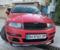 Красный Шкода Фабия, объемом двигателя 1.39 л и пробегом 274 тыс. км за 3800 $, фото 5 на Automoto.ua