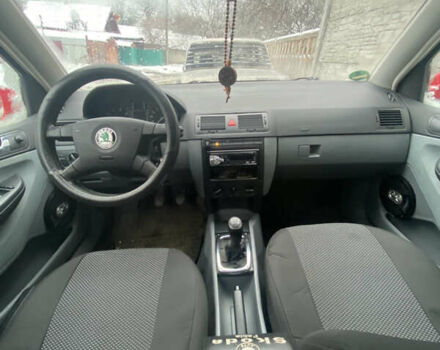 Красный Шкода Фабия, объемом двигателя 1.4 л и пробегом 353 тыс. км за 4100 $, фото 4 на Automoto.ua