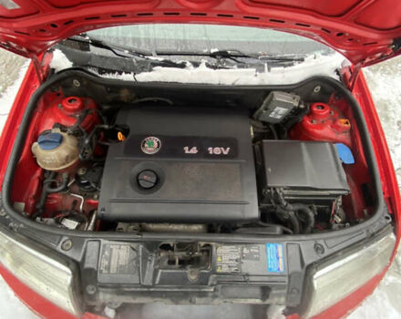 Красный Шкода Фабия, объемом двигателя 1.4 л и пробегом 353 тыс. км за 4100 $, фото 5 на Automoto.ua