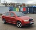Красный Шкода Фабия, объемом двигателя 1.39 л и пробегом 214 тыс. км за 3900 $, фото 1 на Automoto.ua