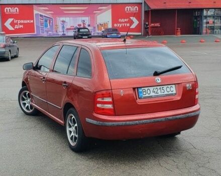 Красный Шкода Фабия, объемом двигателя 1.4 л и пробегом 214 тыс. км за 3900 $, фото 2 на Automoto.ua