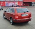 Красный Шкода Фабия, объемом двигателя 1.4 л и пробегом 214 тыс. км за 3900 $, фото 2 на Automoto.ua