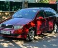 Красный Шкода Фабия, объемом двигателя 1.4 л и пробегом 279 тыс. км за 3000 $, фото 1 на Automoto.ua