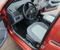 Красный Шкода Фабия, объемом двигателя 1.39 л и пробегом 214 тыс. км за 3900 $, фото 5 на Automoto.ua