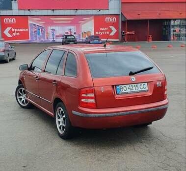 Красный Шкода Фабия, объемом двигателя 1.39 л и пробегом 214 тыс. км за 3900 $, фото 7 на Automoto.ua