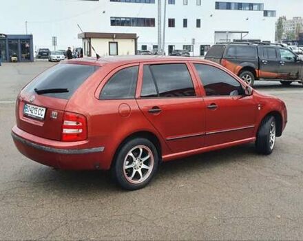 Красный Шкода Фабия, объемом двигателя 1.39 л и пробегом 214 тыс. км за 3900 $, фото 9 на Automoto.ua